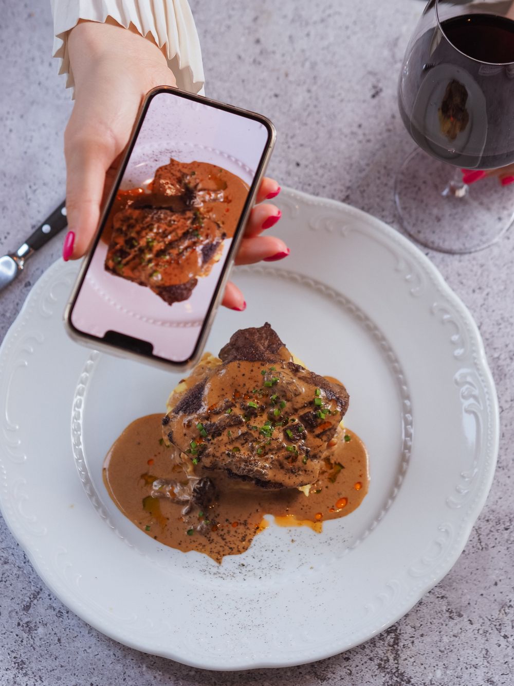 A creator photographing a meal